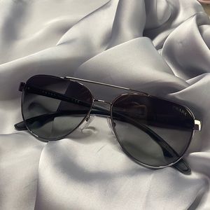 PRADA sunglasses.
